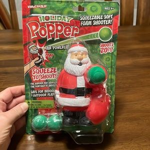 Santa Claus Holiday Popper Squeezable Shooter Fun Toy (Brand New)